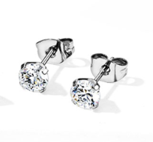 Pair of silver titanium earrings with clear cubic zirconia and push backs on a white background