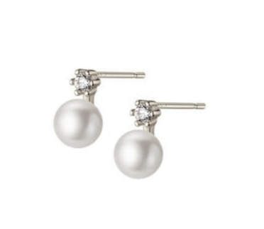 A pair of sterling silver children's earrings with a central cubic zirconia and two pearl-like beads.