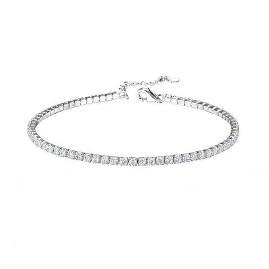 A sterling silver children's bracelet with a clear CZ tennis bracelet design and an extension, featuring a lobster clasp.