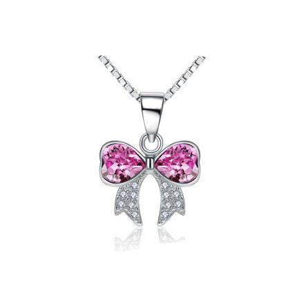 Children's necklaces featuring a sterling silver bow pendant with pink and white cubic zirconia stones.