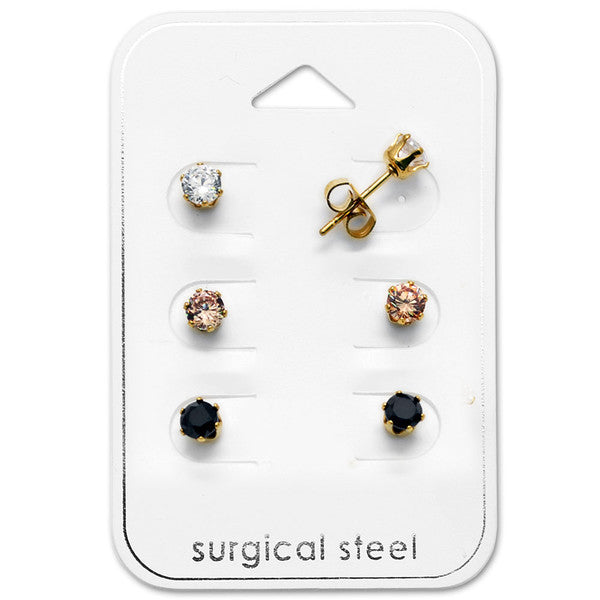 Gold CZ stud earrings set showcasing three pairs of hypoallergenic surgical steel earrings with cubic zirconia.