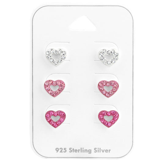 Heart earrings set featuring 3 pairs of sterling silver open hearts with cubic zirconia in white and pink shades.