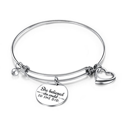 Inspiration bracelets featuring a charm, heart symbol, and engraved disc with motivational quote.