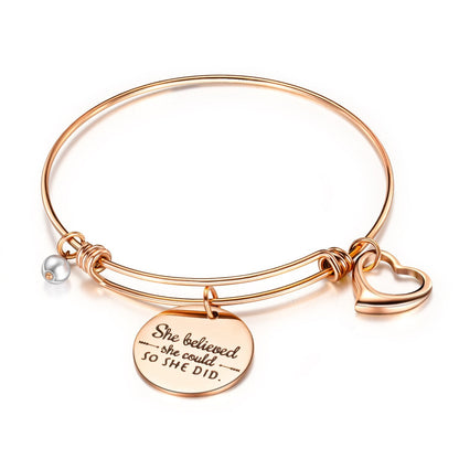 Inspiration bracelets featuring a rose gold bangle, pearl, heart charm, and inspirational disc.