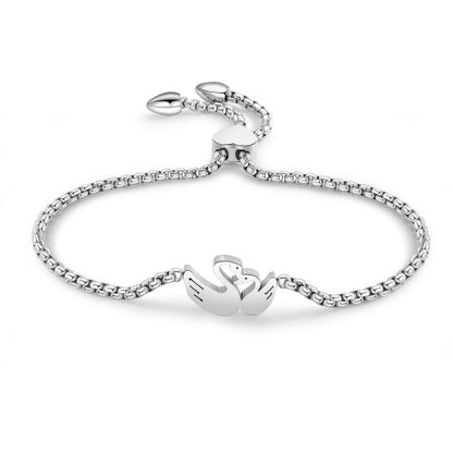 Swan Bracelet - Surgical Steel Adjustable Bolo with mother and baby swan design for elegant everyday wear.