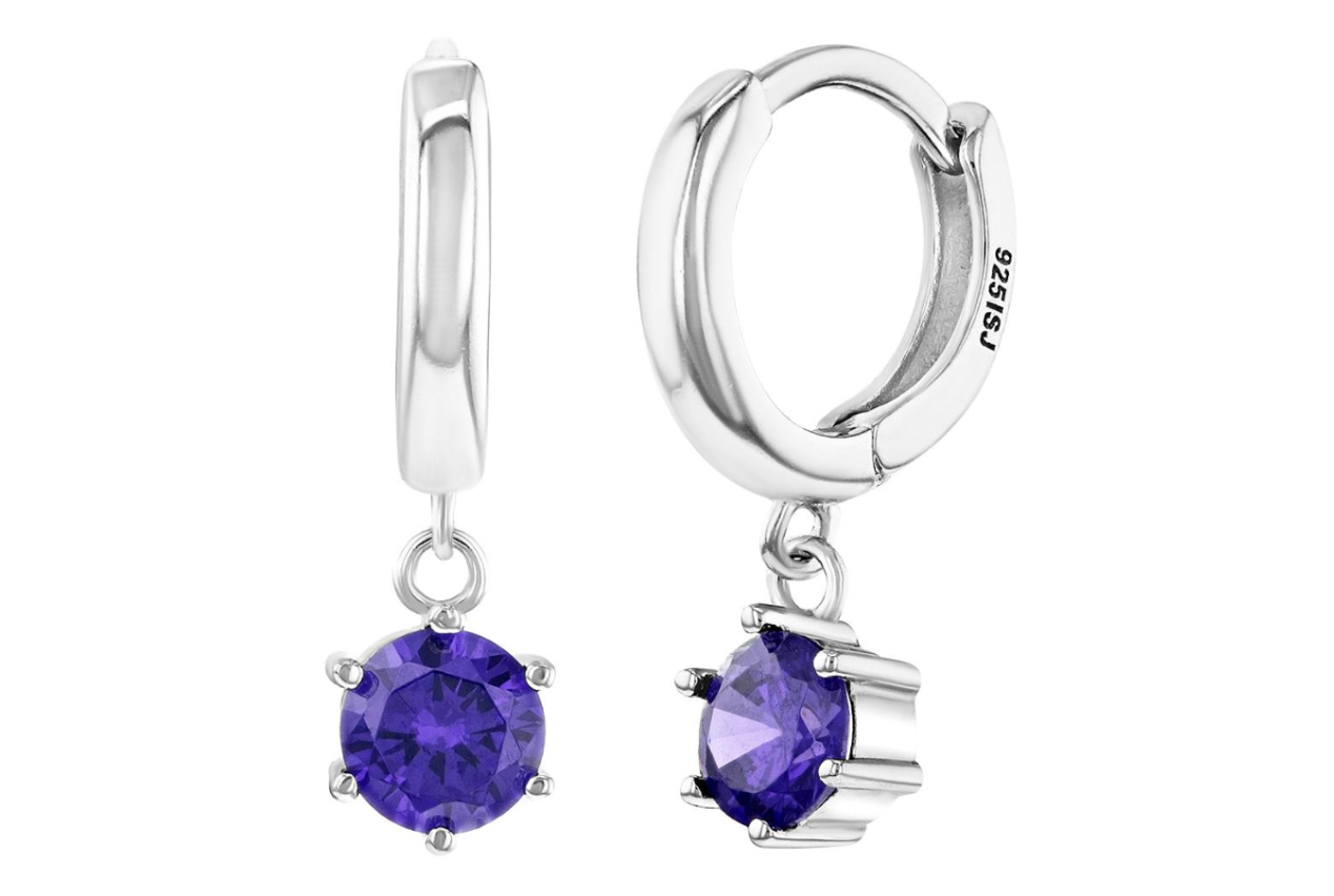 A pair of sterling silver huggie hoop earrings with amethyst cubic zirconia dangles.