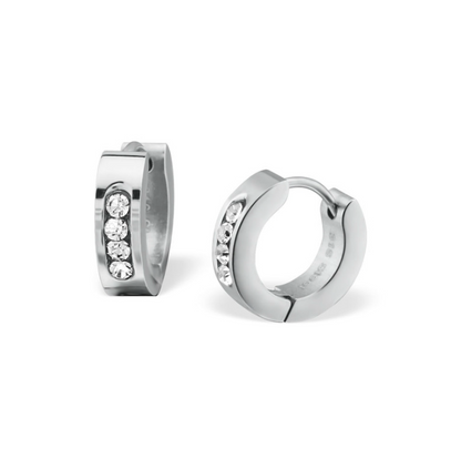 A pair of silver surgical steel huggies with cubic zirconia stones set in a circular pattern.