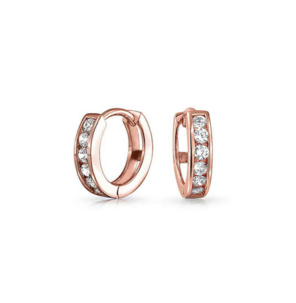 Rose gold CZ huggies featuring sparkling white AAA cubic zirconia in surgical steel.