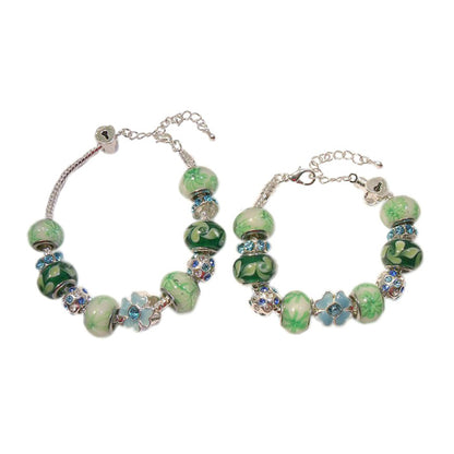 Mothers' Bracelets:   European Style Bracelets with Blue, Green and White Lampwork Beads