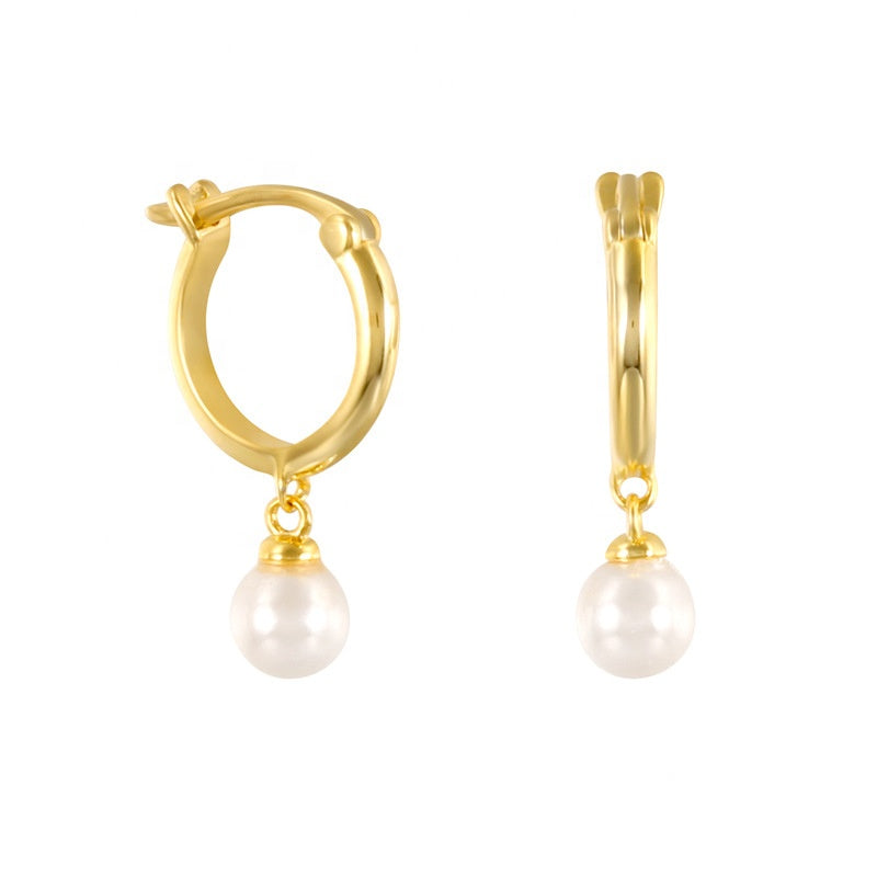 A pair of gold plated sterling silver snap back hoop earrings with white pearl adornments.