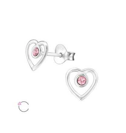 A pair of sterling silver open heart-shaped children's earrings with pink La Crystale CZs.