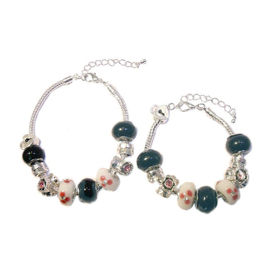 Mother's Bracelets:   European style Bracelets, with pinks, white and black lampwork beads