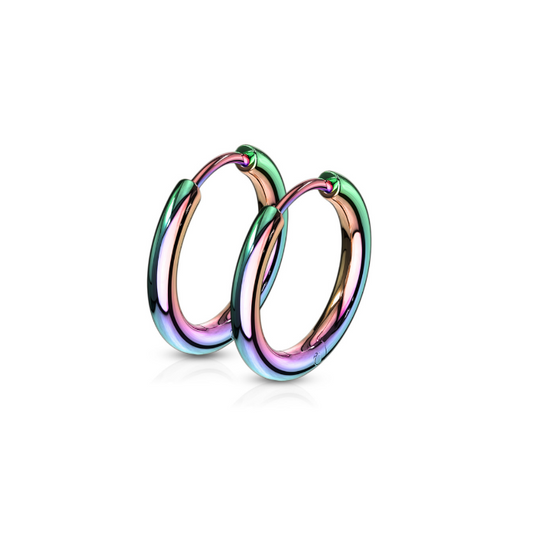 Pair of anodized surgical-steel hinged hoop earrings featuring a reflective rainbow gradient finish, each a smooth tubular band with a click-shut closure