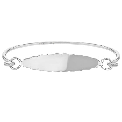 Sterling-silver baby ID bangle bracelet with a scalloped-edge name plate and looped ends on a rounded wire band, shown on a white background.