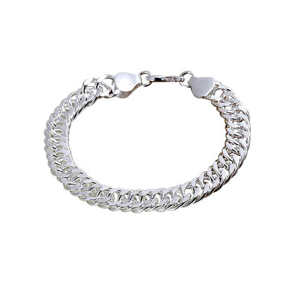 Sterling silver chunky flat Cuban curb baby bracelet for boys or girls, featuring a unique twist design.