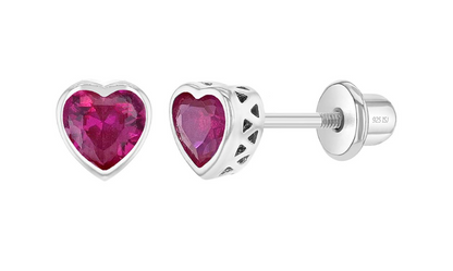 A pair of sterling silver heart-shaped earrings with ruby cubic zirconia stones, designed for children and featuring screw back closures.