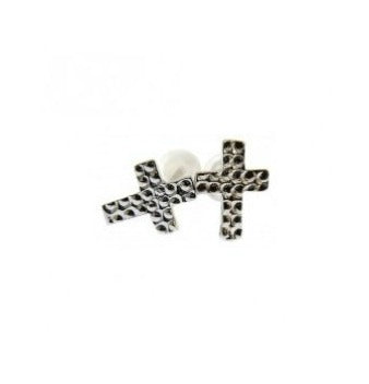 Close-up detail of sterling silver tiny cross earrings showing delicate religious design